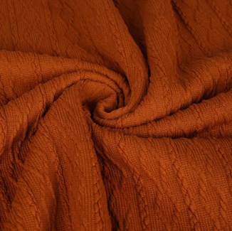 Cum afectează procesele de vopsire și finisare a țesăturilor de îmbrăcăminte performanța țesăturilor și experiența de purtare?